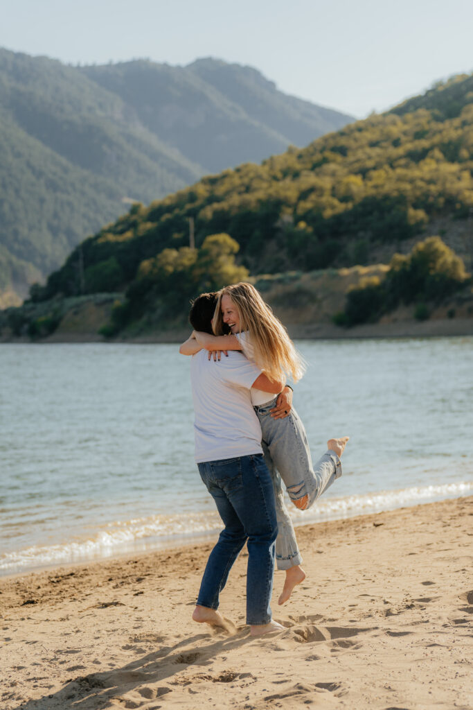 Couple hugging along the waterfront